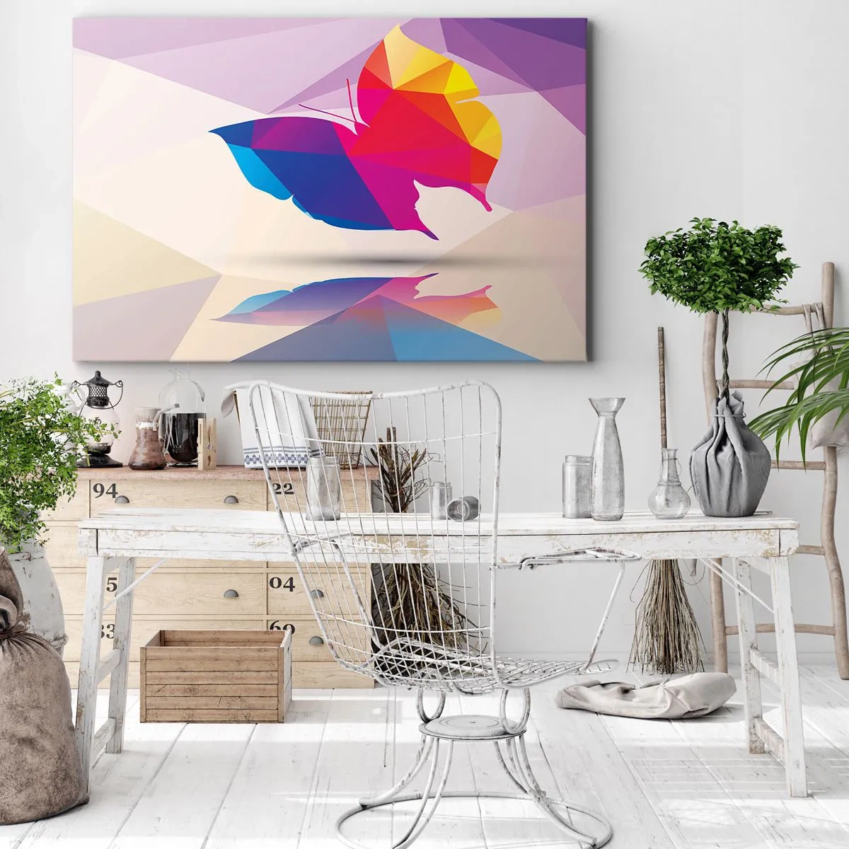 Vászonkép - Geometrikus pillangó sziluett élénk színekben - 70x50cm - Szivárvány pillangó - Modern fali dekoráció nappalihoz és hálószobához ARTTOR