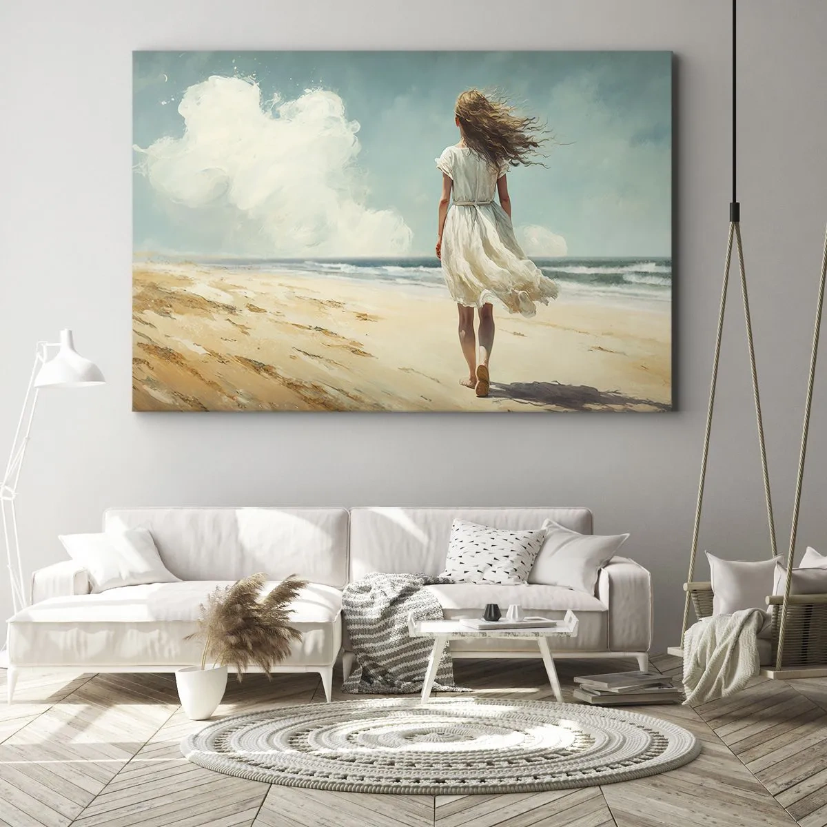 Vászonkép - Egy fehér ruhás nő sétál a tengerparton egy napsütéses napon - 70x50cm - Találkozás a nappal és a széllel - Modern fali dekoráció nappalihoz és hálószobához ARTTOR