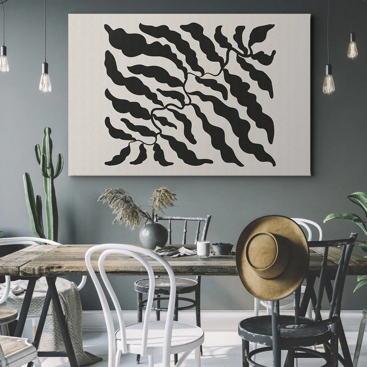 Vászonkép - Világos háttér előtt fekete levelekkel rendelkező gallyak - 70x50cm - A tér természete - Modern fali dekoráció nappalihoz és hálószobához ARTTOR