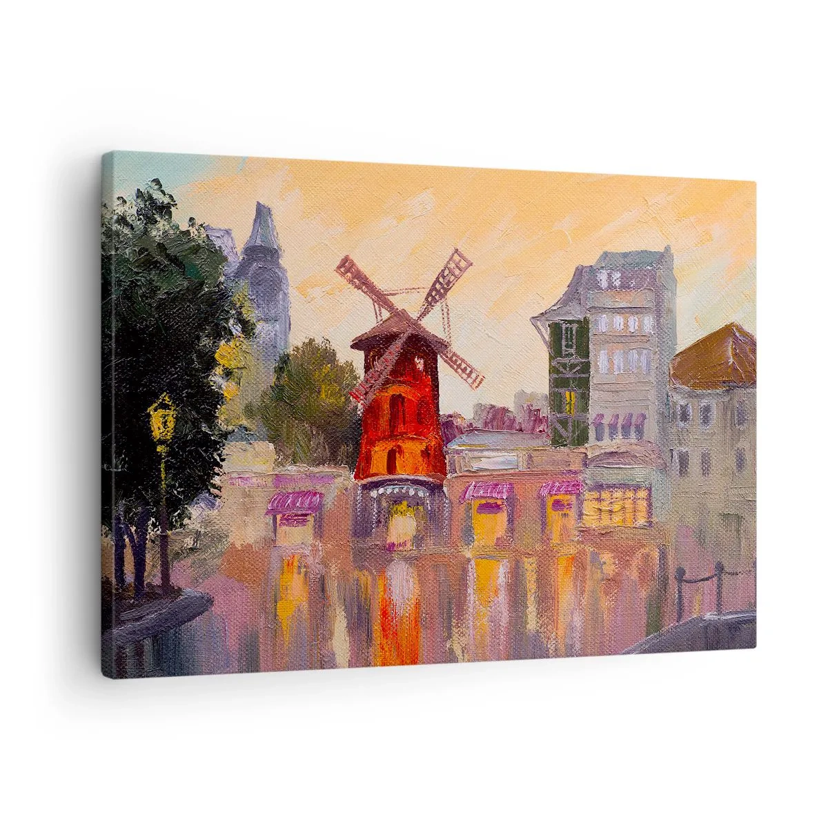 Vászonkép - A Moulin Rouge piros szélmalma a városkép ölelésében - 70x50cm - Párizsi ikonok - Moulin Rouge - Modern fali dekoráció nappalihoz és hálószobához ARTTOR