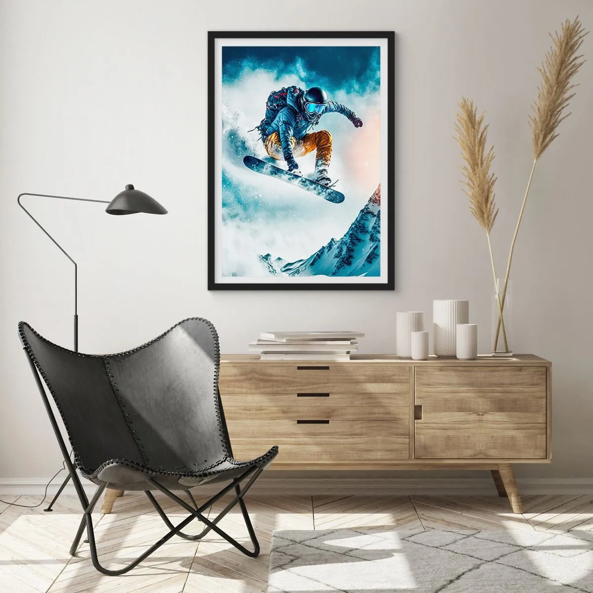 Poszter fehér keretben - Egy snowboardos átrepül egy hófödte hegycsúcs felett - 50x70cm - Extrém érzelmek - Modern fali dekoráció nappalihoz és hálószobához ARTTOR